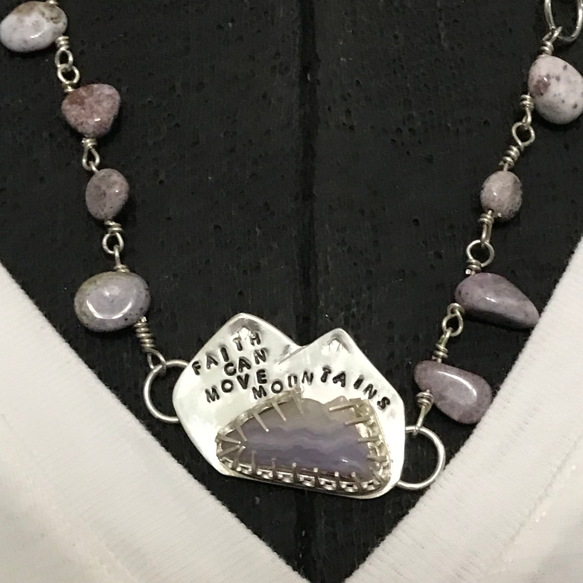 sterling silver necklace set with amethyst stones